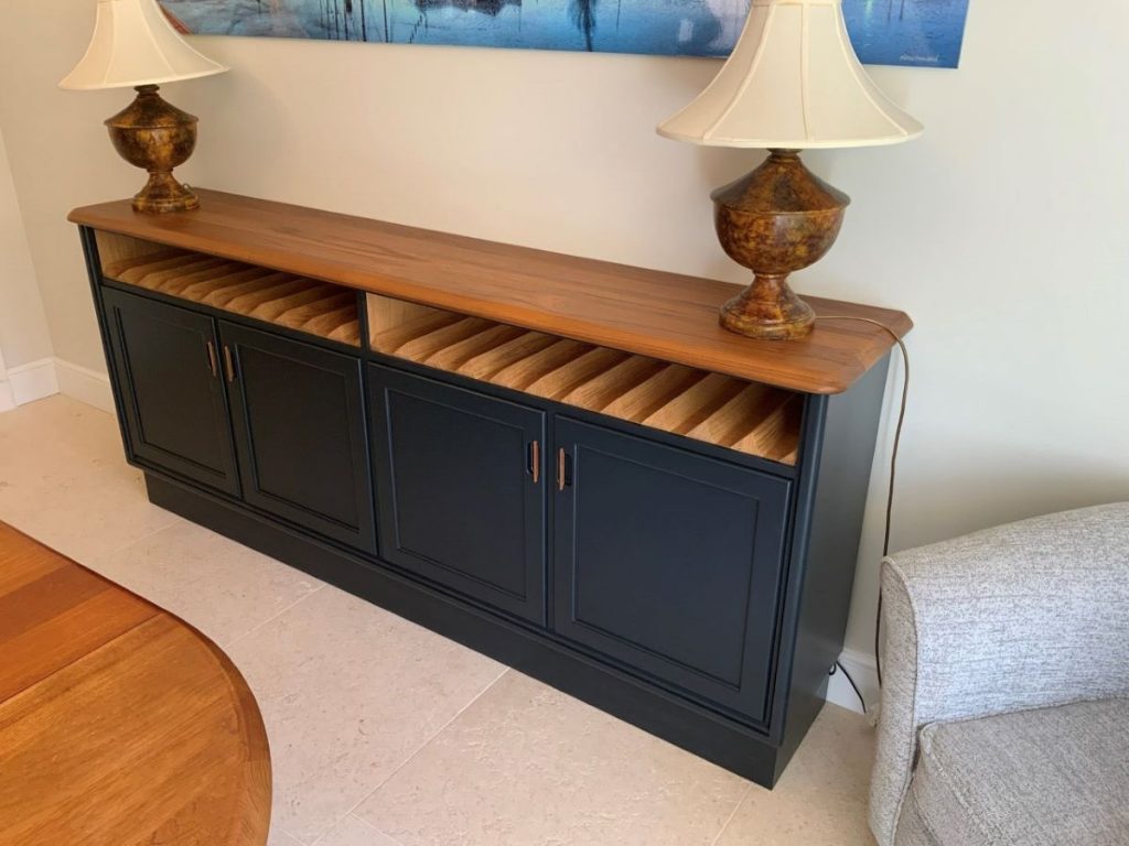 Dark blue painted 70's inspired sideboard with a sleek solid teak top.